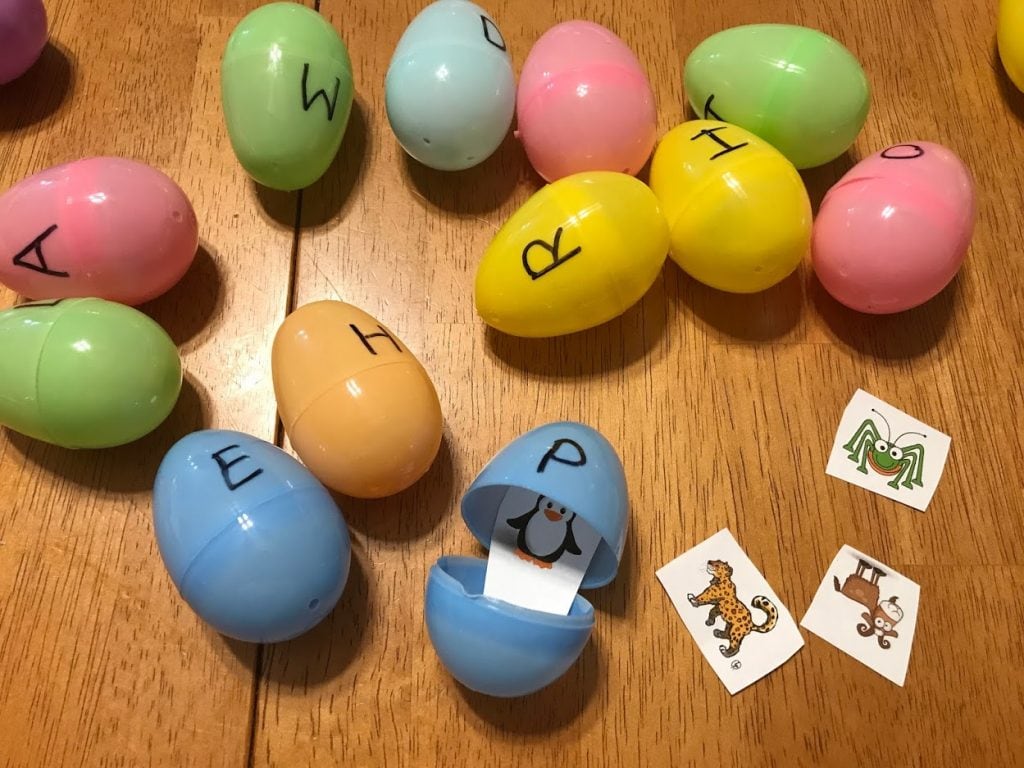 Plastic eggs with letters and animal pictures